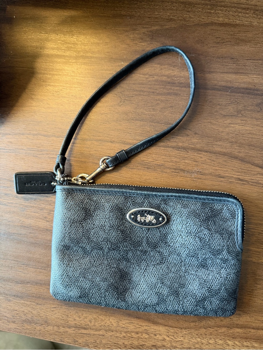 Coach Signature Wristlet in Charcoal Black with Gold Hardware